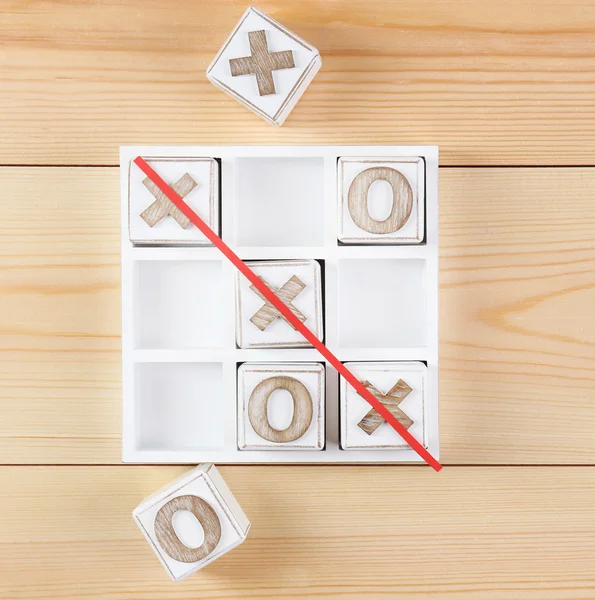 Game of Tic Tac Toe on wooden background — Stock Photo, Image