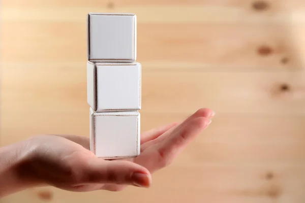 Educational cubes in hand — Stock Photo, Image