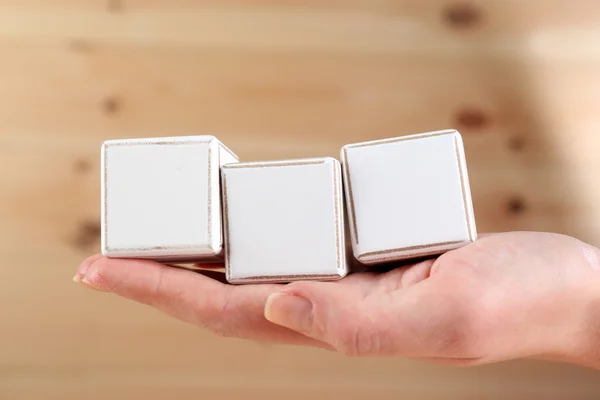 Educational cubes in hand — Stock Photo, Image