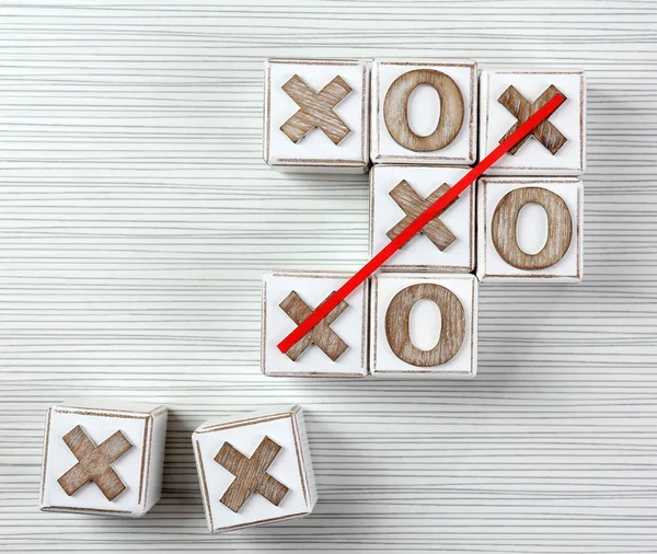 Game of Tic Tac Toe on wooden background — Stock Photo, Image