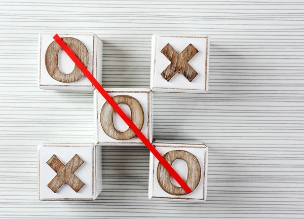 Spel van Tic Tac Toe op houten achtergrond — Stockfoto