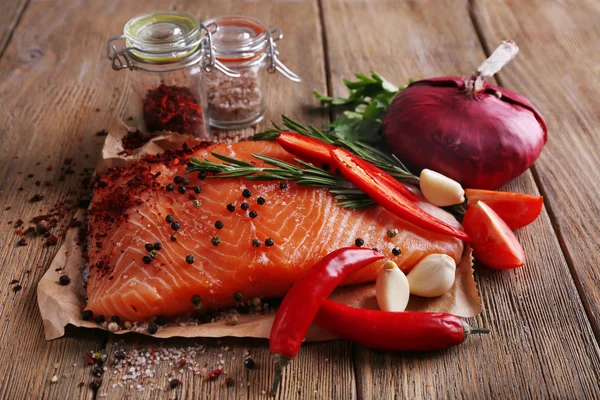 Fresh salmon with spices — Stock Photo, Image