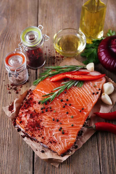 Fresh salmon with spices — Stock Photo, Image