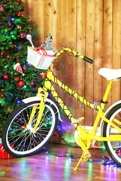 Bicycle near Christmas tree — Stock Photo, Image
