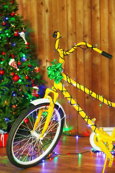 Bicycle near Christmas tree — Stock Photo, Image