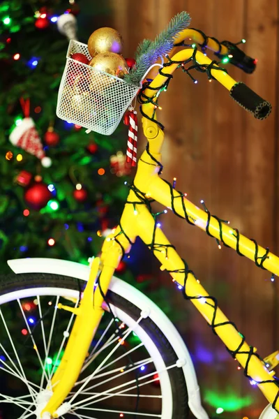 Bicycle near Christmas tree — Stock Photo, Image