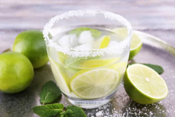 Lemonade in glass on tray — Stock Photo, Image