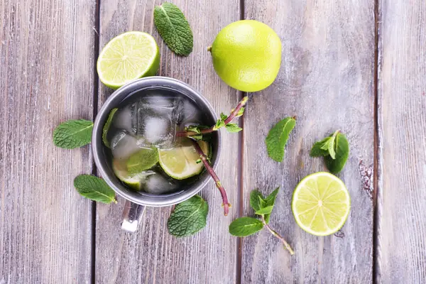 Lemonade in metal cup — Stock Photo, Image