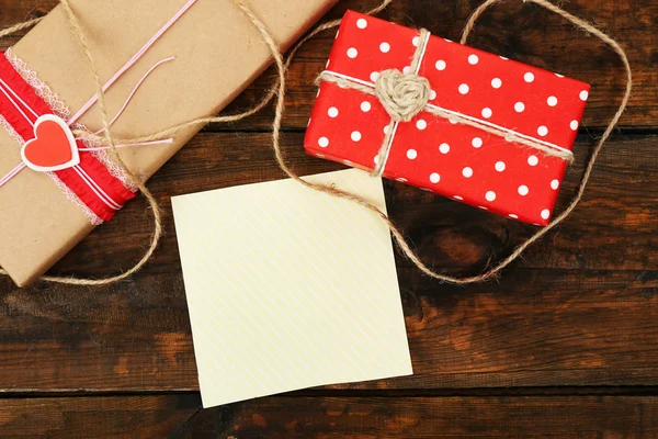 Gift boxes with card — Stock Photo, Image