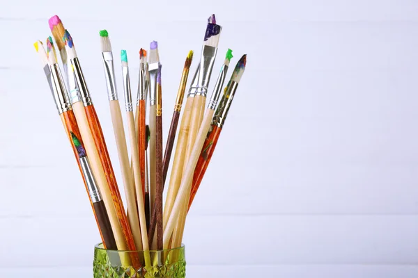 Paint brushes with paints — Stock Photo, Image