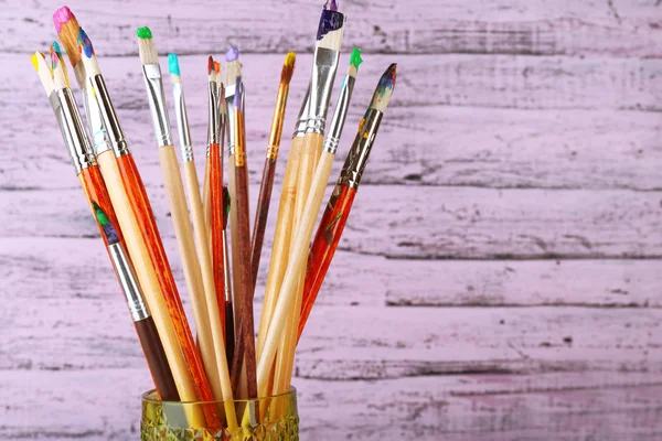 Paint brushes with paints — Stock Photo, Image