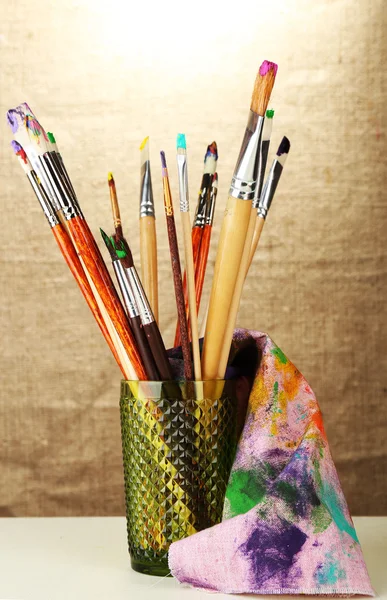 Paint brushes with paints — Stock Photo, Image