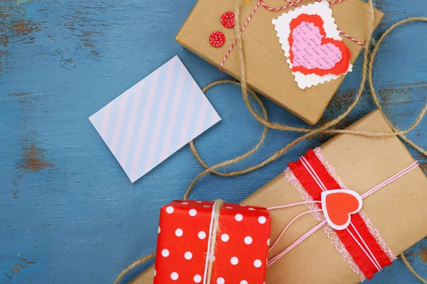 Gift boxes with card — Stock Photo, Image