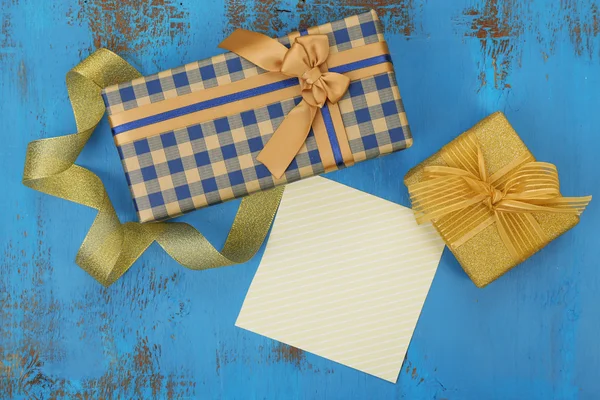 Gift boxes with card — Stock Photo, Image