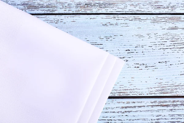 White napkins on wooden table — Stock Photo, Image