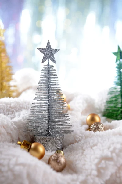 Decorative Christmas tree on snow close-up — Stock Photo, Image