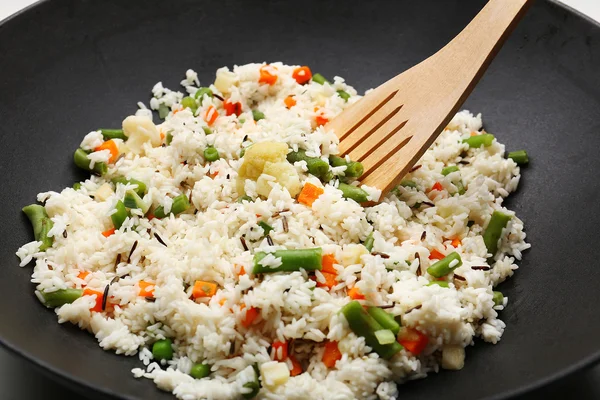 Tasty rice preparing in wok, close-up — Stock Photo, Image