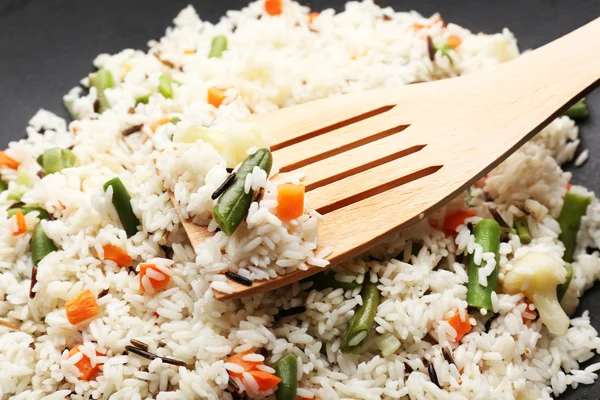 Tasty rice preparing in wok, close-up — Stock Photo, Image