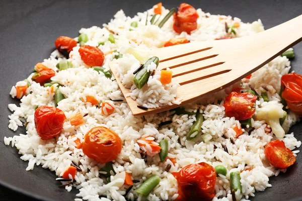 Tasty rice preparing in wok, close-up — Stock Photo, Image