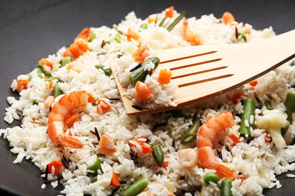 Tasty rice preparing in wok, close-up — Stock Photo, Image