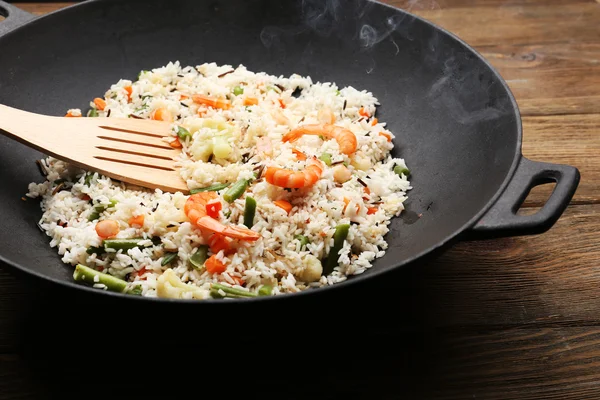 Tasty rice preparing in wok, close-up — Stock Photo, Image