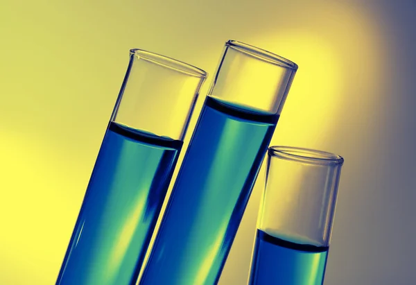 Test-tubes filled with color fluid close-up — Stock Photo, Image