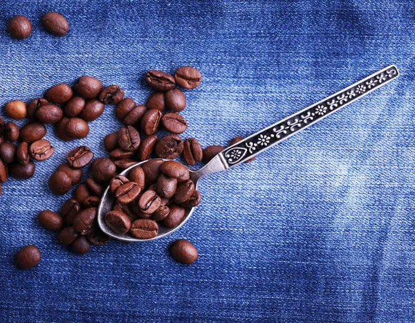 Spoon with coffee beans — Stock Photo, Image