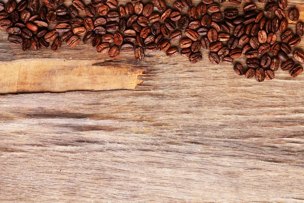 Coffee beans on table — Stock Photo, Image