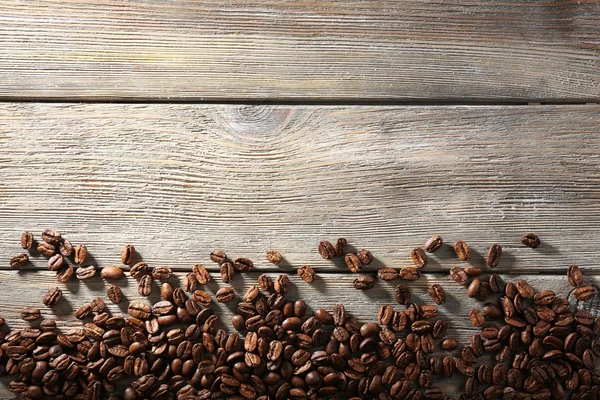 Coffee beans on table — Stock Photo, Image