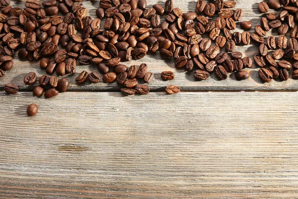 Coffee beans on table — Stock Photo, Image