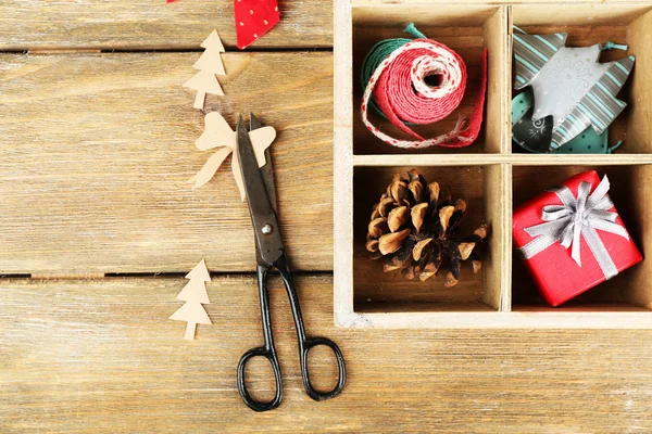 Christmas gifts in wooden crate — Stock Photo, Image