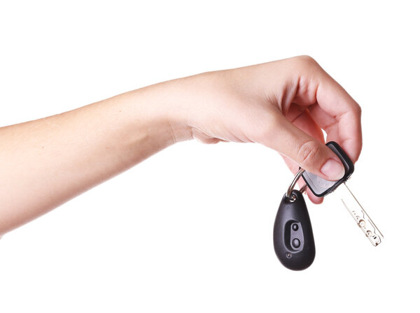 Ключ с безделушкой изолирован на белом
