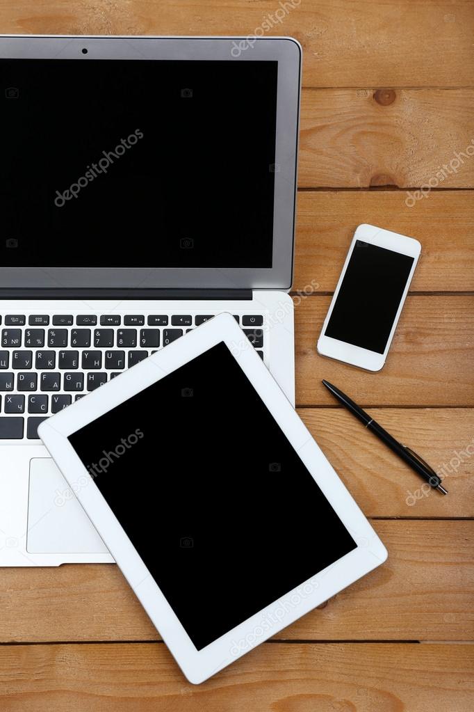 Open notebook and digital tablet