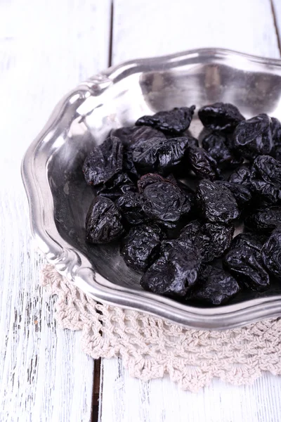 Metal plate of prunes — Stock Photo, Image