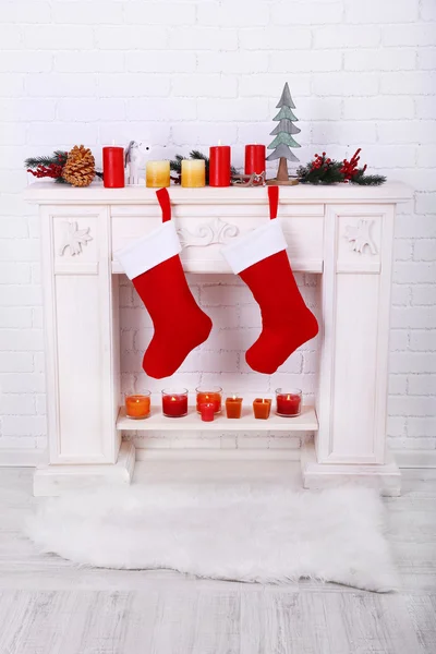 Christmas socks on fireplace — Stock Photo, Image