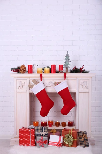 Christmas socks on fireplace — Stock Photo, Image