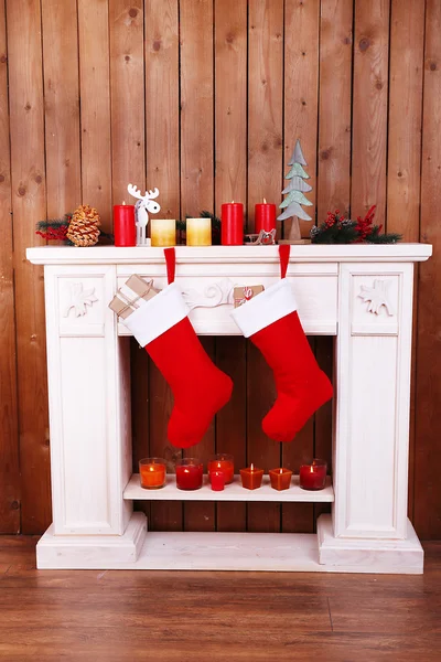 Christmas socks on fireplace — Stock Photo, Image