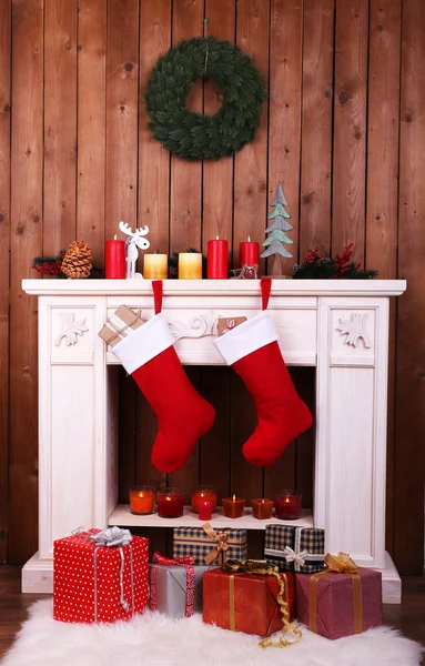 Christmas socks on fireplace — Stock Photo, Image