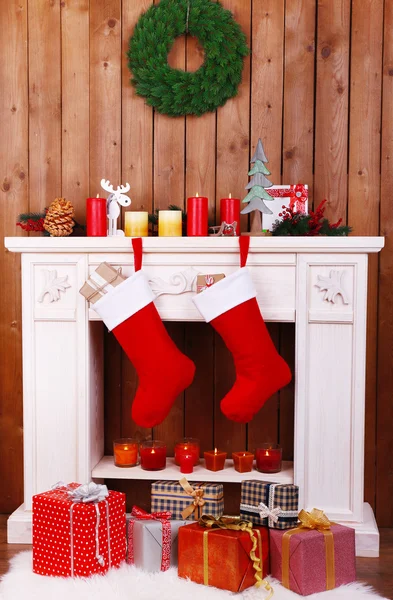 Christmas socks on fireplace — Stock Photo, Image