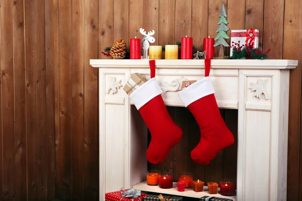 Christmas socks on fireplace — Stock Photo, Image