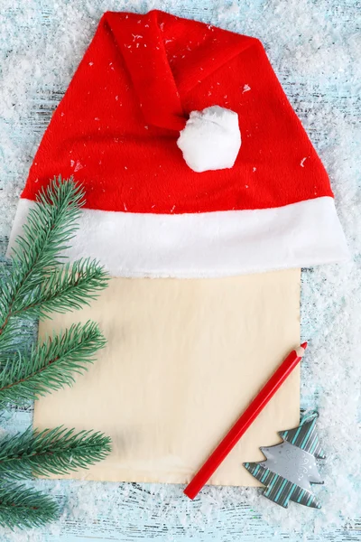 Čepice Santa s větev jedle — Stock fotografie