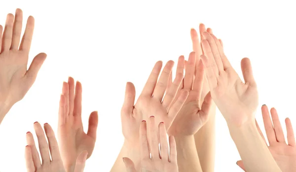 Grupo de personas levantando manos aisladas sobre fondo blanco — Foto de Stock