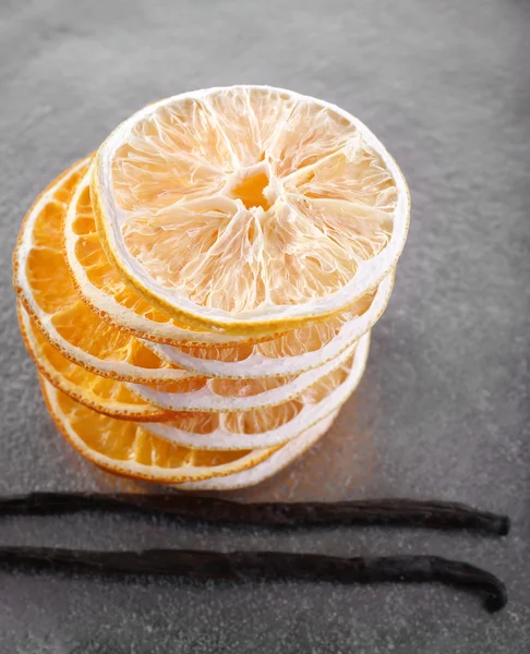 Orange with vanilla beans — Stock Photo, Image