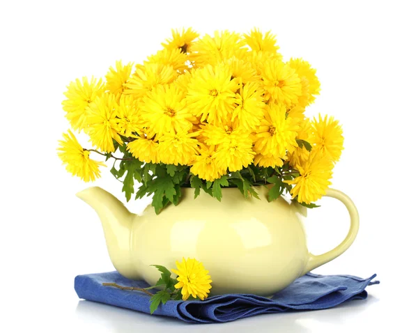 Yellow flowers in teapot — Stock Photo, Image