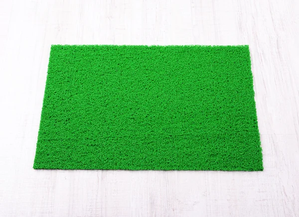 Green carpet on floor close-up — Stock Photo, Image