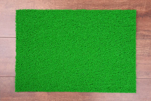 Green carpet on floor — Stock Photo, Image