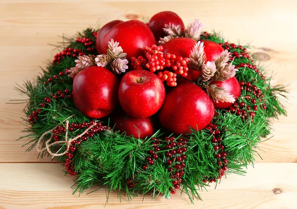 Christmas apples on table — Stock Photo, Image