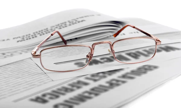 Glasses and newspapers background — Stock Photo, Image