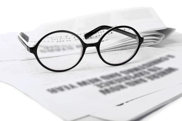 Glasses and newspapers background — Stock Photo, Image