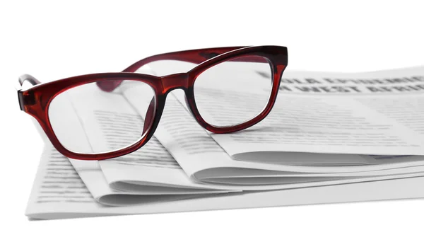 Glasses and newspapers background — Stock Photo, Image